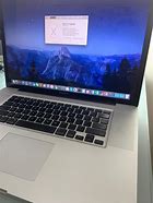 macbook 201win7需要开启AHC5年苹果公司出品笔记本电脑